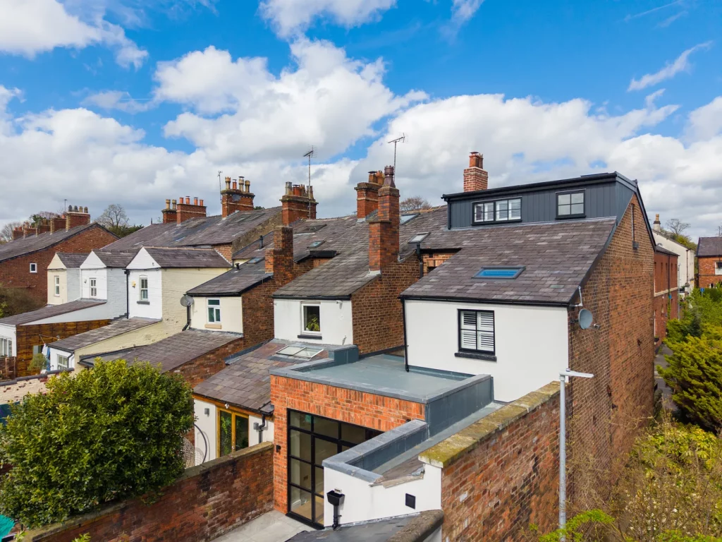 Elevated view of the rear extension and loft dormer among Macclesfield rooftops